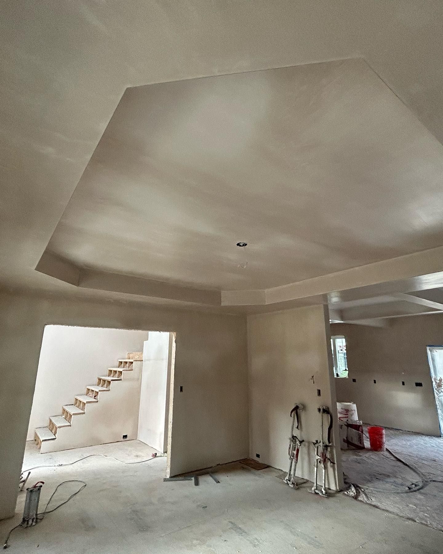 smooth repaired plaster ceiling in a finished room