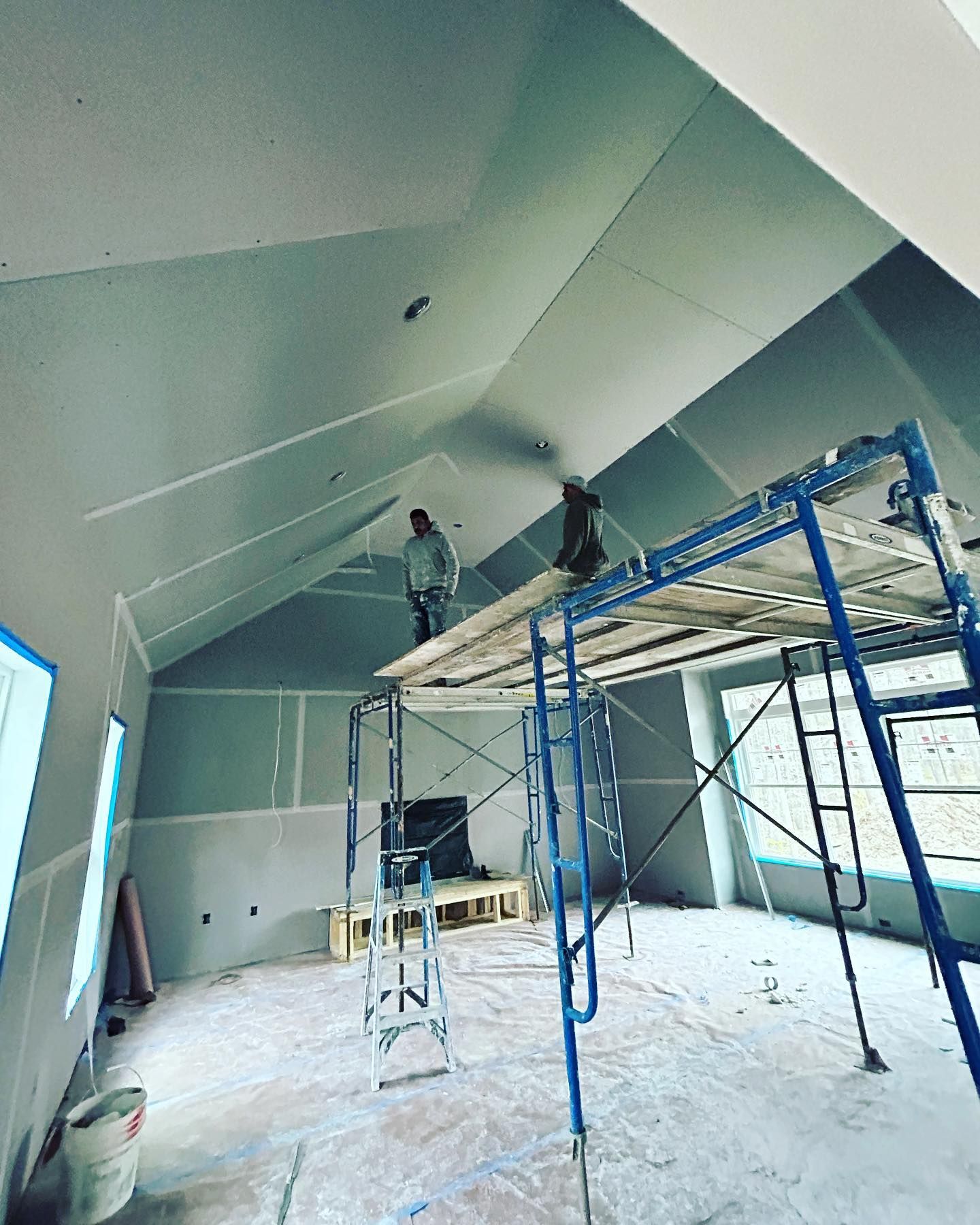 skim-coated interior wall with a smooth paint-ready finish